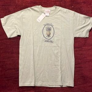 Longaberger T-Shirt. New with tag. Medium. Light green.